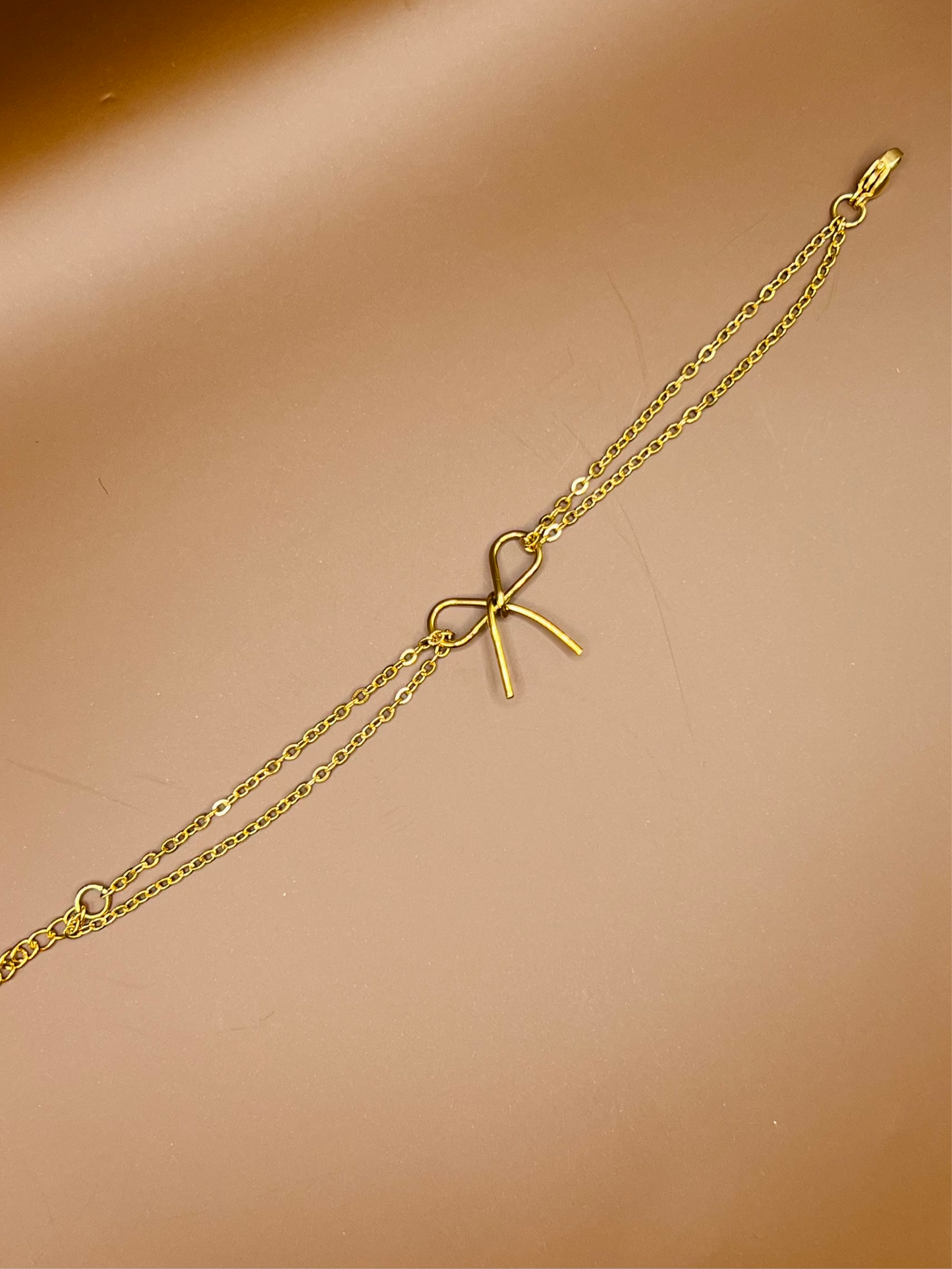 susstudio-handgemaaktesieraden-armband-strik-goud-2