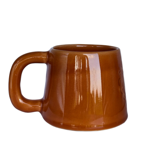 Detailfoto van zijkant theemok Marokkaanse keramiek terracotta met hart gravering