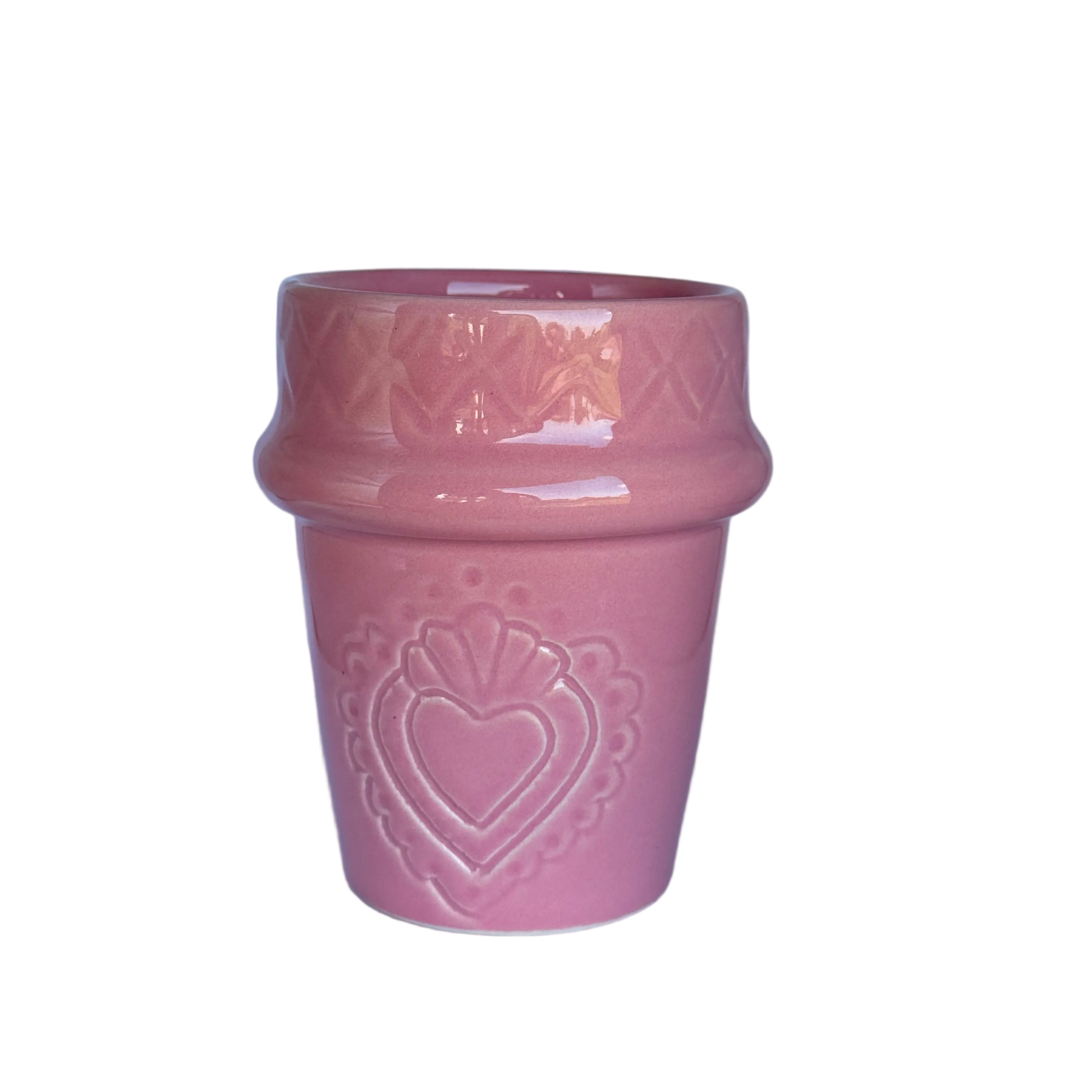 roze koffiekopje van marokkaans keramiek met hartvorm gegraveerd