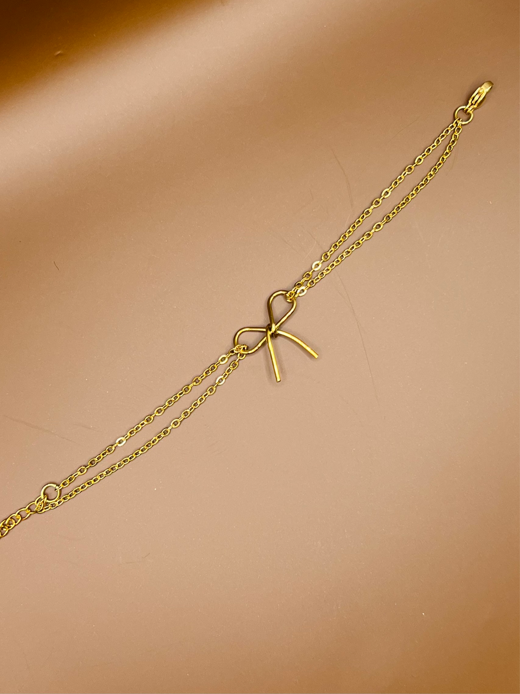 susstudio-handgemaaktesieraden-armband-strik-goud-2